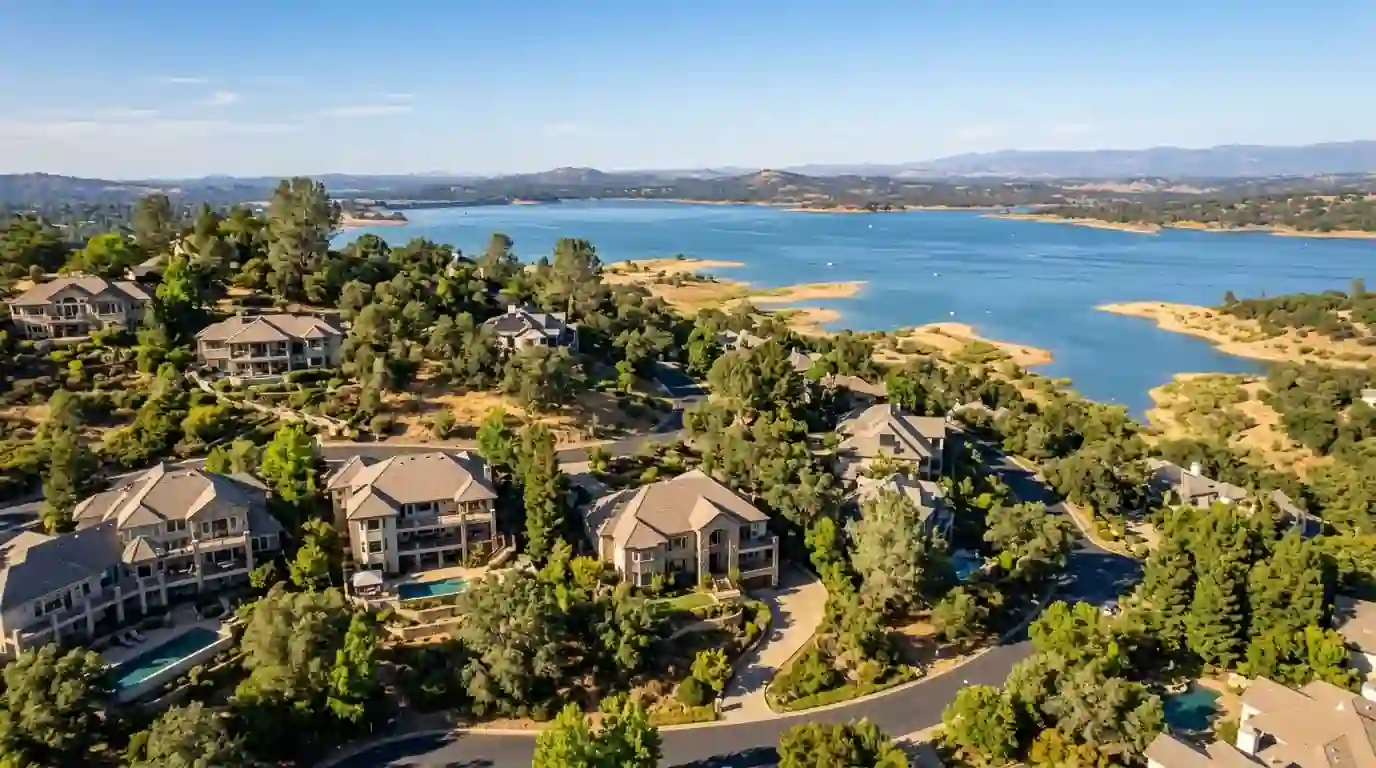 Hillside homes above Folsom Lake California on a clear afternoon